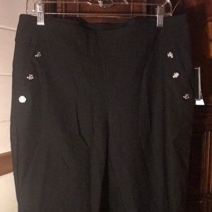 Counterparts black stretchy dress pants with silver buttons.  Size L.  NWT